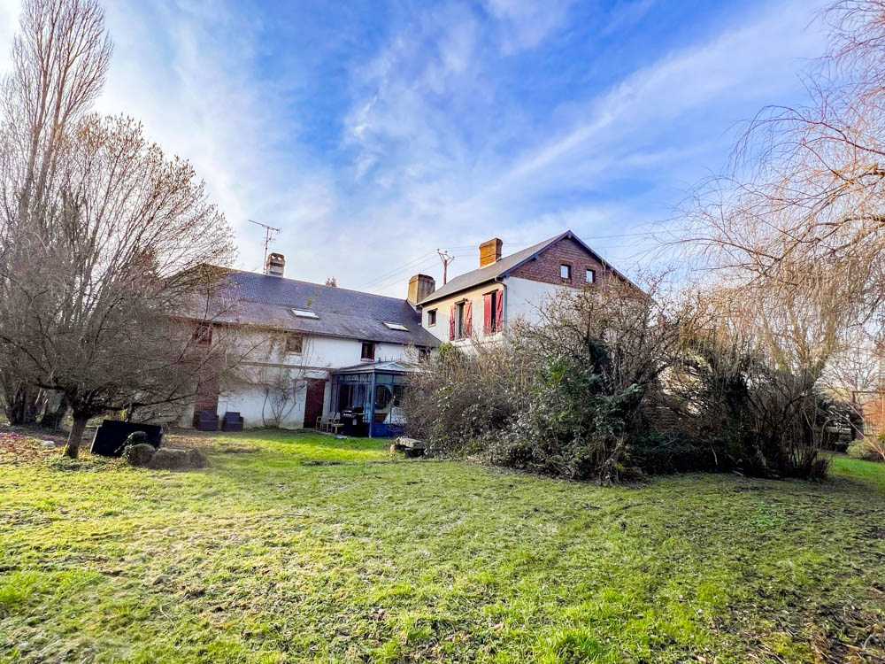 une maison de bourg atypique au bord de Touques
